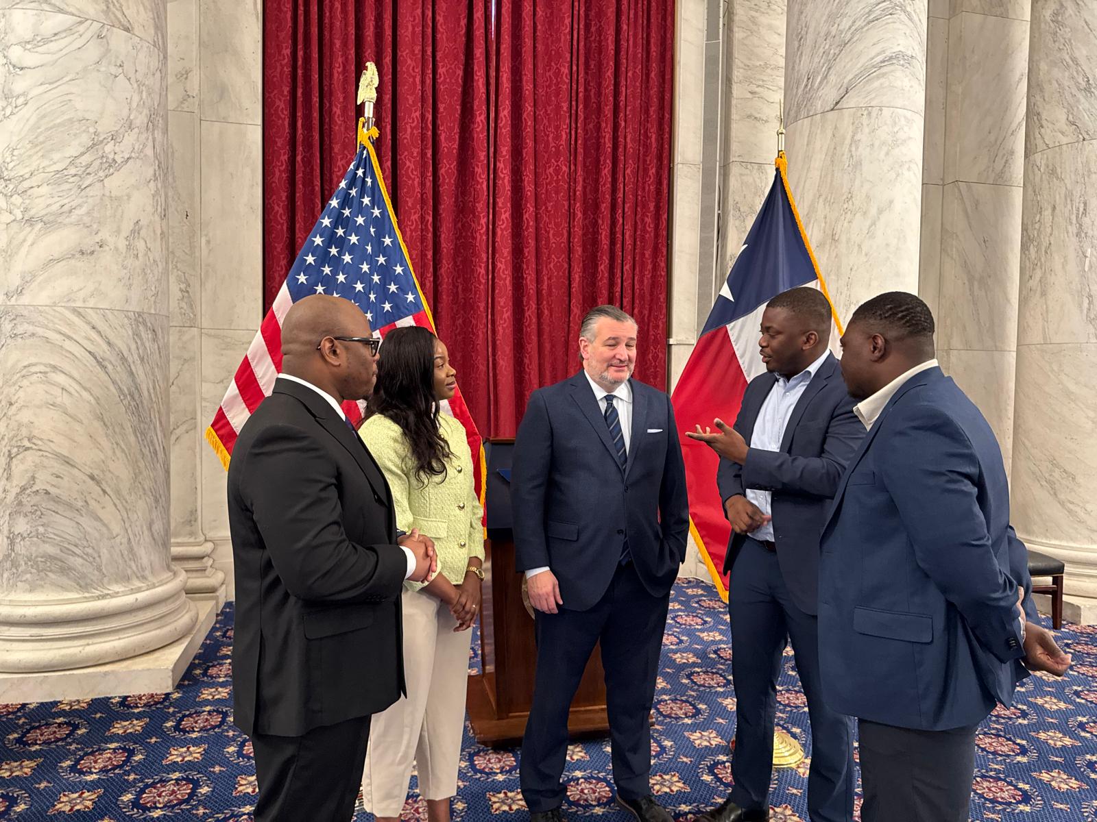 USCSN representatives meeting with a United States senator in a formal government setting